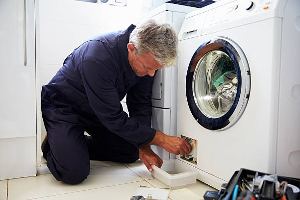 Bosch Washing Machine is getting repair by handyman in the house